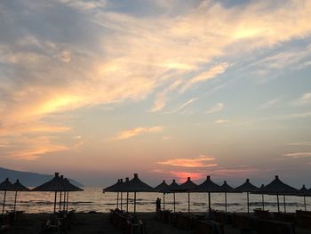 Romantic couple silhouette at sunset