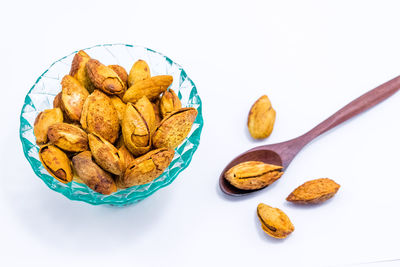 High angle view of food on table against white background