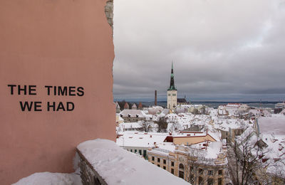 Panoramic view of city buildings against sky during winter