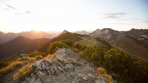 Scenic view of mountains against sky during sunset