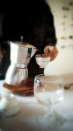 Close-up of coffee cup on table