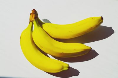 Bananas against white background
