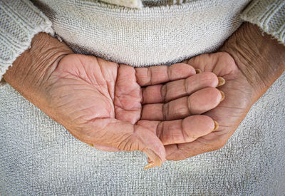 High angle view of woman holding hands