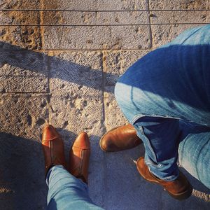 Low section of people standing on floor