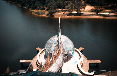 High angle view of fishing boats moored at lakeshore