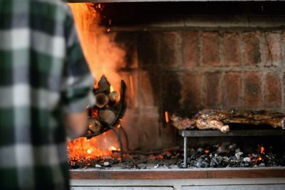 Close-up of fire on barbecue grill