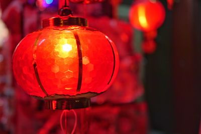 Close-up of illuminated lantern hanging at night