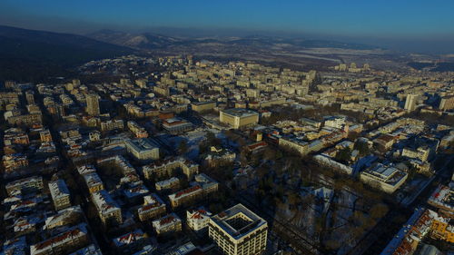 High angle view of illuminated cityscape against sky