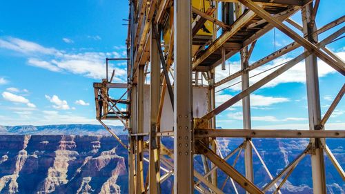 Metallic structure against sky