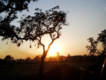 Scenic view of landscape at sunset