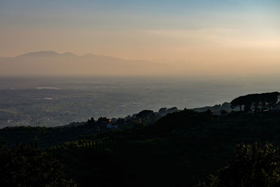 Scenic view of landscape against sky during sunset