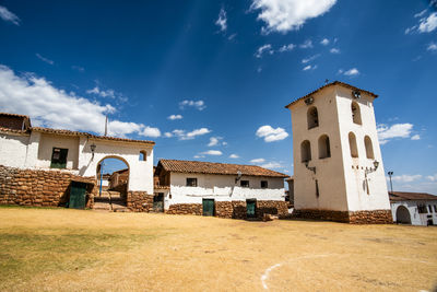 House on field against sky