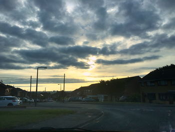 Road against dramatic sky during sunset