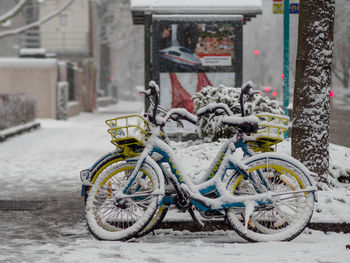 Bicycles parked in snow