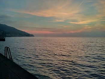 Scenic view of sea at sunset