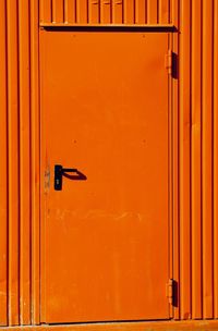 Full frame shot of orange door