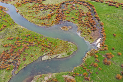 High angle view of river amidst land