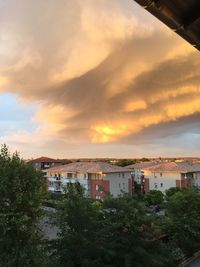 Cityscape against sky during sunset