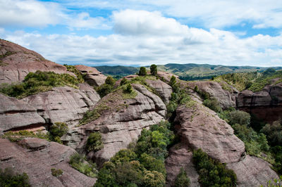 Scenic view of rocky mountains against sky