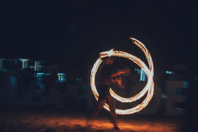 Blurred motion of illuminated lighting equipment at night