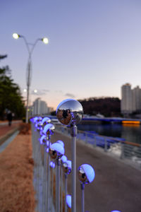Street light against blue sky