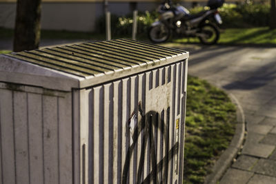 High angle view of meter box on sidewalk