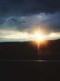 Scenic view of silhouette landscape against sky during sunset