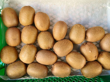 Full frame shot of kiwi fruits in store