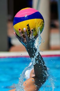 Close-up of boy swimming in pool