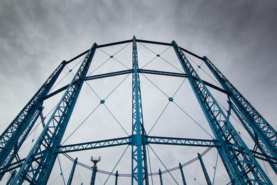 Low angle view of metal structure against sky