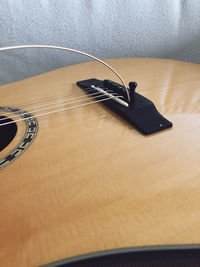 High angle view of guitar on table at home