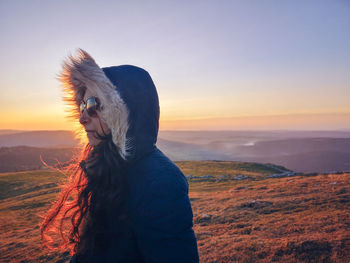 View of a horse at sunset