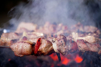 Meat on barbeque grill