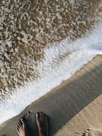 Standing on beach