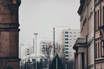 Low angle view of buildings against clear sky