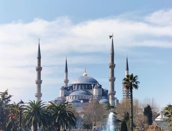 Low angle view of mosque against sky