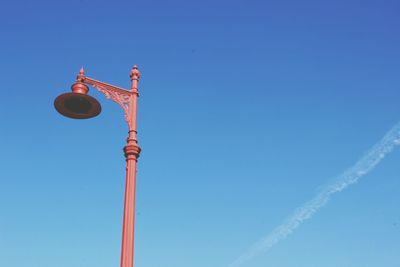 Low angle view of building against clear blue sky