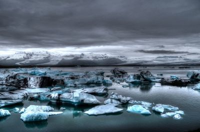 Scenic view of frozen sea against sky