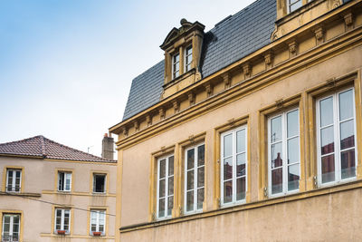 Low angle view of residential building against sky