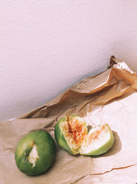 Stylish freshness wallpaper. food minimal aesthetic. figs and shadows sunlight on paper 