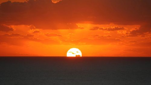 Scenic view of sunset over sea