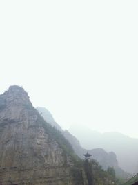 Scenic view of mountains against clear sky