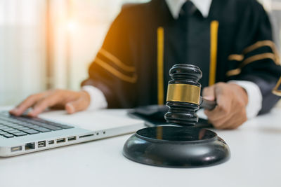 Man using laptop on table