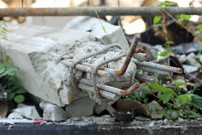 Close-up of rusty tied up on metal