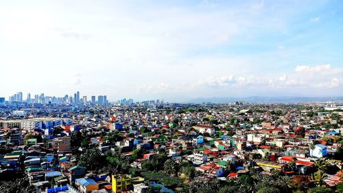 High angle shot of townscape against sky