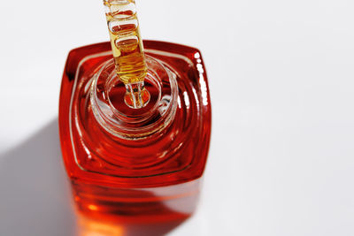 Close-up of drink on white background