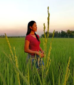 Woman standing in a field