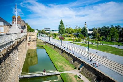 High angle view of bridge over river against buildings