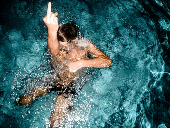 High angle view of person swimming in pool