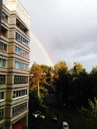 Rainbow over city